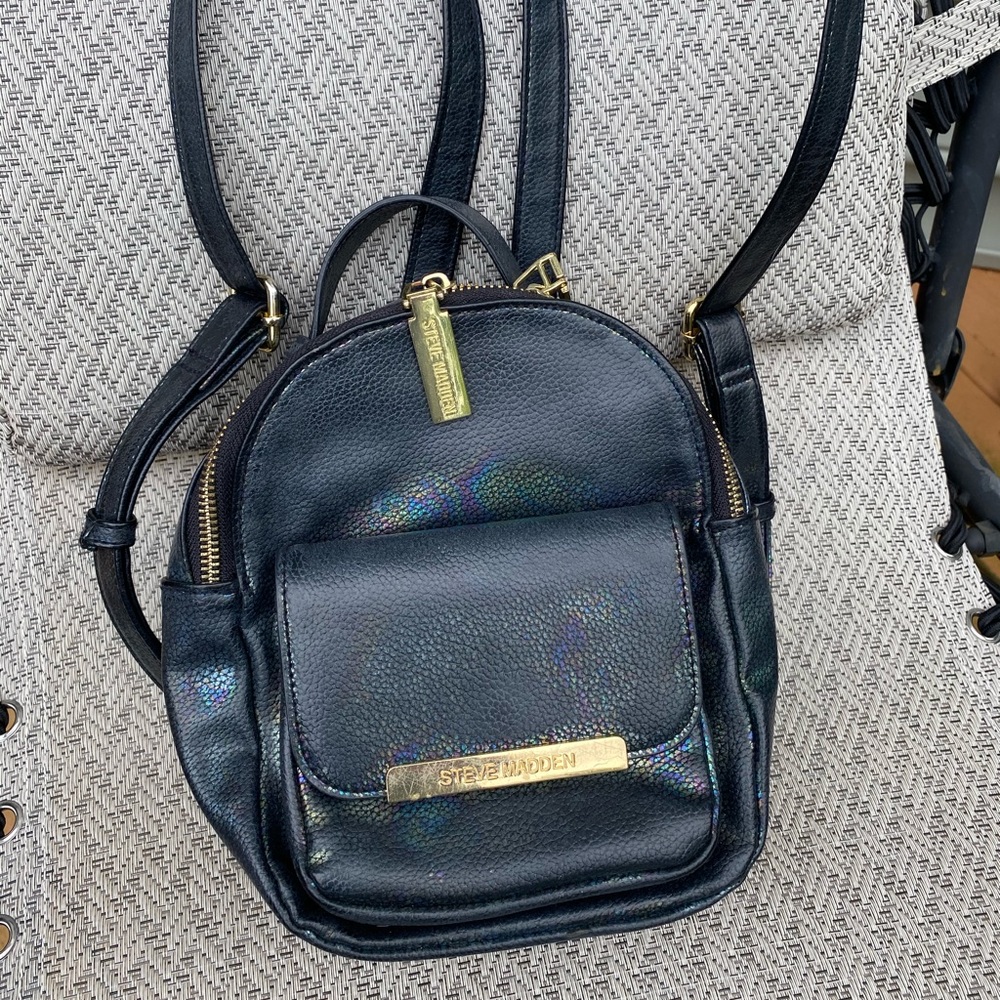 Unique mini backpack/purse by Steve Madden